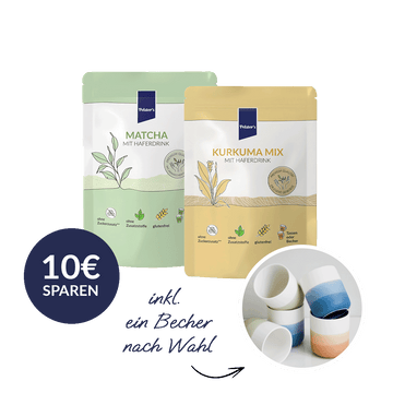 Glow Bundle mit Matcha mit Haferdrink und Kurkuma Mix und 10€ sparen auf einem Becher mit der Farbe seiner Wahl