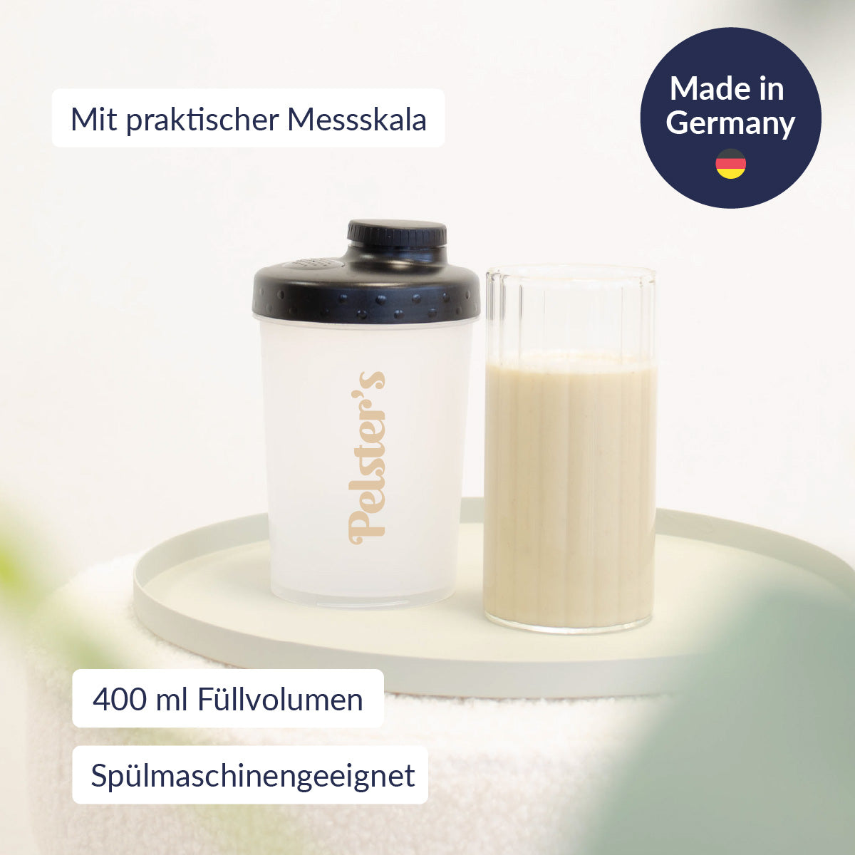 Mini pelster's plastikshaker mit gefülltem Glas und drei wichtigen USPs